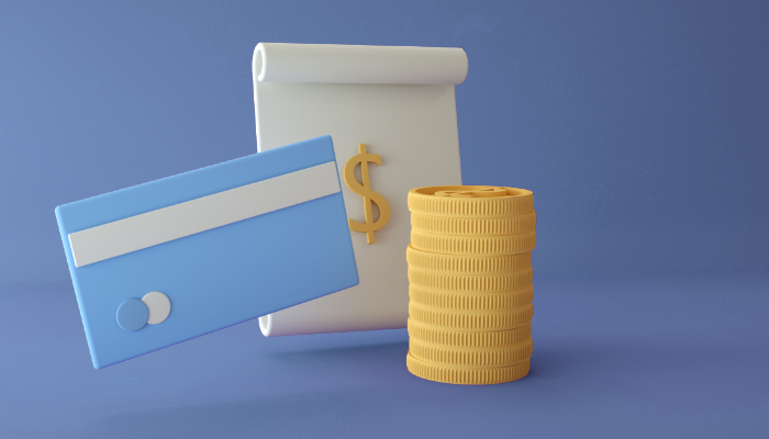 Blue credit card, stack of gold coins, and rolled paper with dollar sign on blue background.